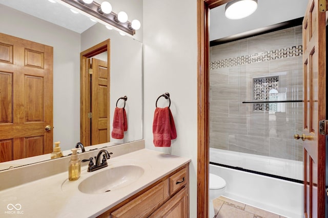 2384 Fairfax Dr, Columbus, IN 47203 - bathroom featuring vanity, bath / shower combo with glass door, and tile patterned floors