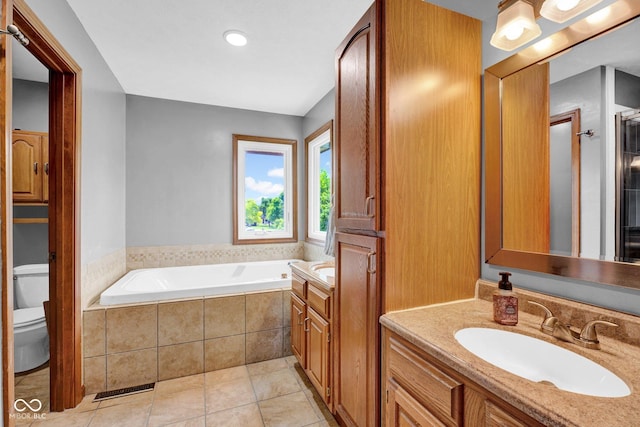 2384 Fairfax Dr, Columbus, IN 47203 - bathroom with vanity, a bath, and tile patterned flooring