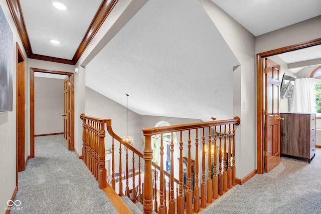 2384 Fairfax Dr, Columbus, IN 47203 - corridor featuring carpet floors, an upstairs landing, ornamental molding, recessed lighting, and vaulted ceiling