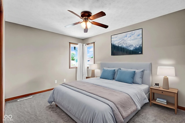 2384 Fairfax Dr, Columbus, IN 47203 - carpeted bedroom featuring baseboards and ceiling fan