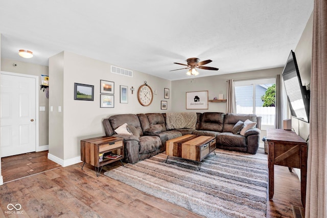 2384 Fairfax Dr, Columbus, IN 47203 - living area featuring a ceiling fan and wood finished floors