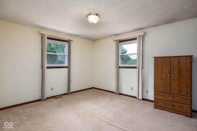 5749 Teresa Dr, Alexandria, IN 46001 - unfurnished bedroom featuring light carpet and baseboards
