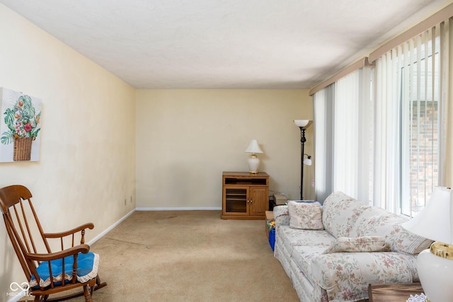 5749 Teresa Dr, Alexandria, IN 46001 - living area with healthy amount of natural light and carpet flooring