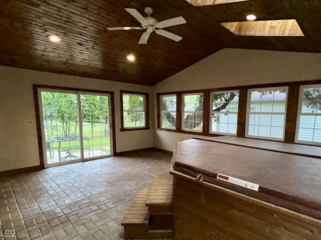7721 Hollybrook Ln, Indianapolis, IN 46227 - sunroom / solarium with lofted ceiling, a jacuzzi, and a skylight