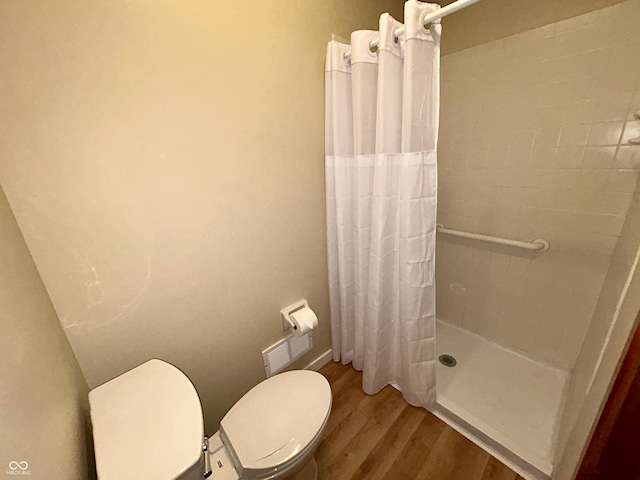 7721 Hollybrook Ln, Indianapolis, IN 46227 - full bath with wood finished floors and tiled shower