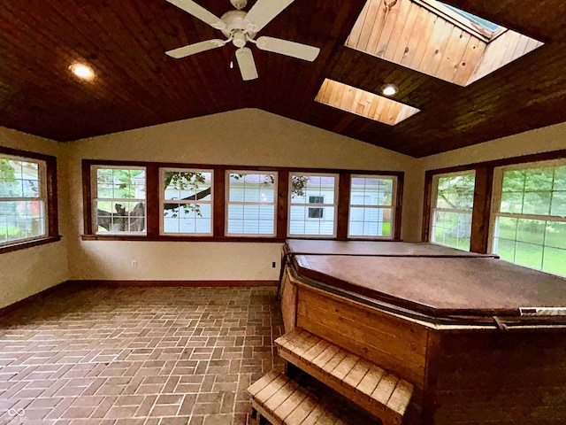 7721 Hollybrook Ln, Indianapolis, IN 46227 - unfurnished sunroom with a hot tub, vaulted ceiling, and a skylight