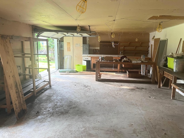 7721 Hollybrook Ln, Indianapolis, IN 46227 - miscellaneous room with unfinished concrete floors