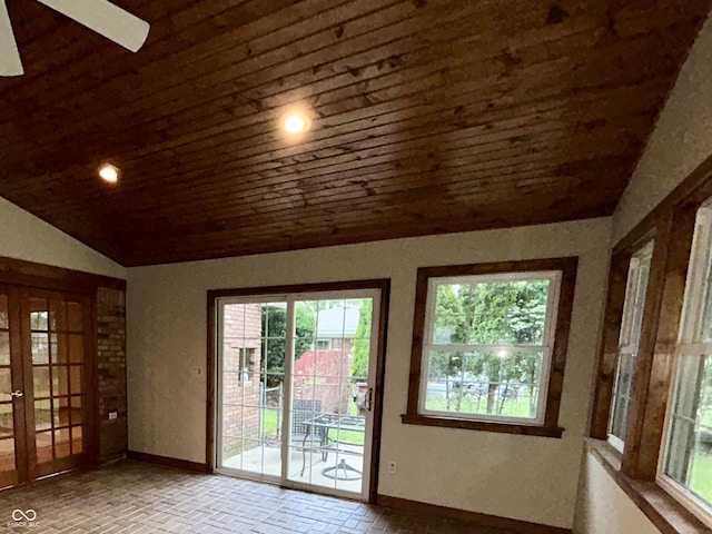 7721 Hollybrook Ln, Indianapolis, IN 46227 - entryway with wood ceiling, vaulted ceiling, plenty of natural light, brick floors, and ceiling fan