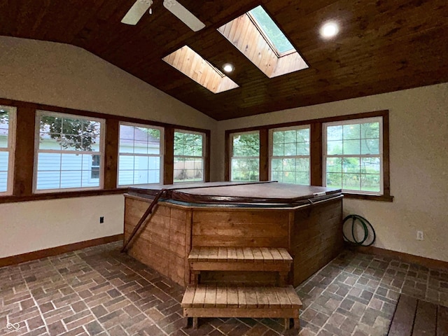 7721 Hollybrook Ln, Indianapolis, IN 46227 - miscellaneous room with lofted ceiling, brick floors, a skylight, wood ceiling, and recessed lighting