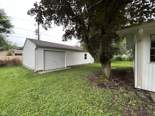 7721 Hollybrook Ln, Indianapolis, IN 46227 - view of yard with an outdoor structure and a detached garage