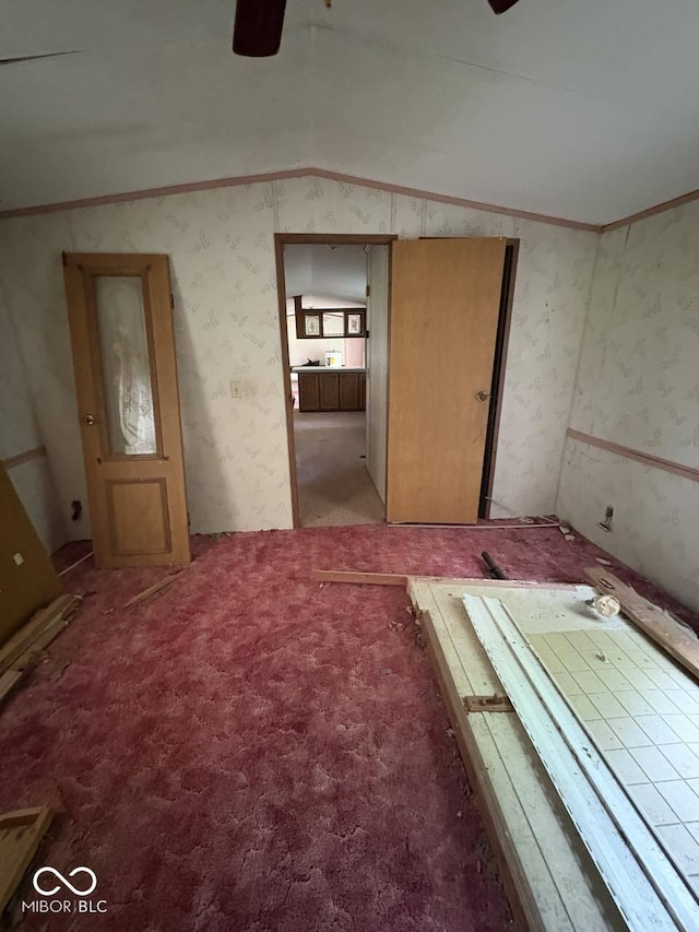 162 Lazy River Pl, Cloverdale, IN 46120 - empty room with lofted ceiling, ceiling fan, wallpapered walls, ornamental molding, and light colored carpet