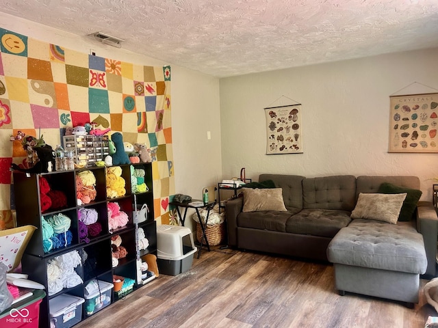 2213 Holden Dr, Anderson, IN 46012 - living room with a textured ceiling and wood finished floors