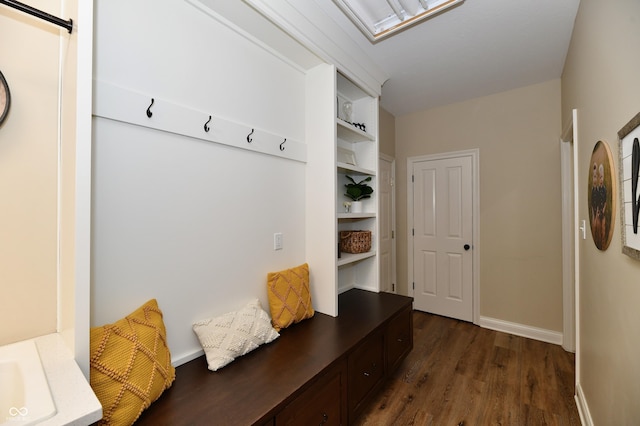 7413 Misty Woods Ln, Indianapolis, IN 46237 - mudroom with dark wood finished floors and baseboards