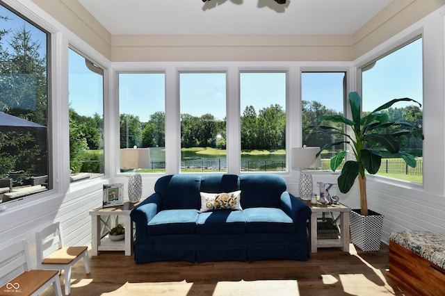 7413 Misty Woods Ln, Indianapolis, IN 46237 - sunroom / solarium with wood finished floors, a water view, and view of wooded area