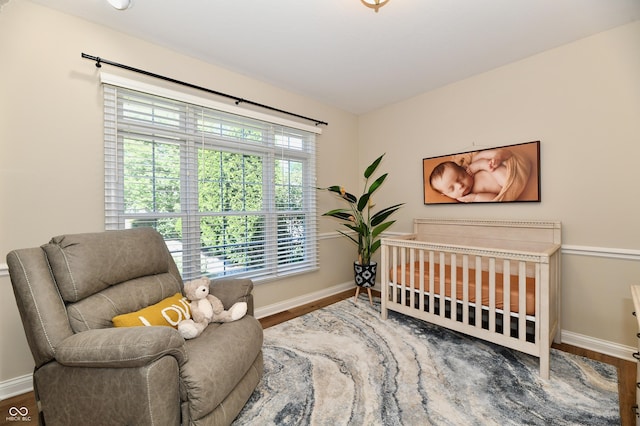 7413 Misty Woods Ln, Indianapolis, IN 46237 - bedroom featuring baseboards and wood finished floors