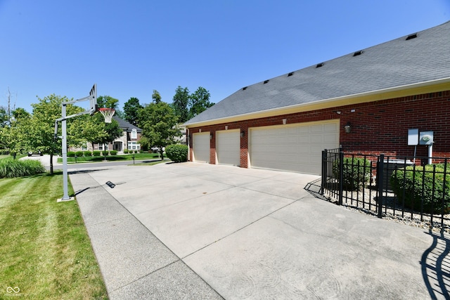 7413 Misty Woods Ln, Indianapolis, IN 46237 - view of side of home featuring brick siding and roof with shingles