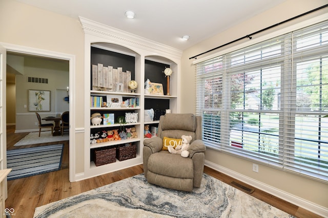 7413 Misty Woods Ln, Indianapolis, IN 46237 - living area with baseboards and wood finished floors