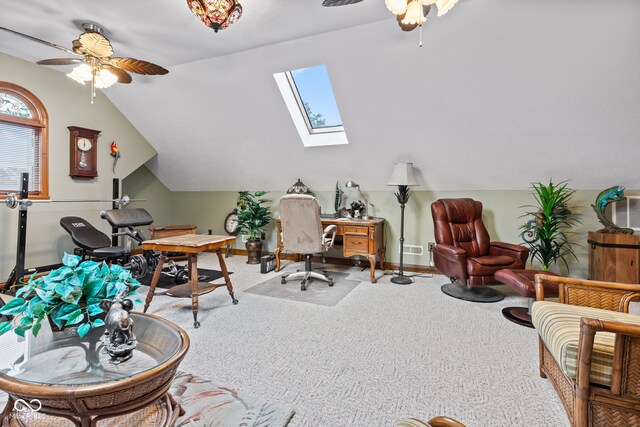 6980 White Oak Dr, Avon, IN 46123 - carpeted home office with ceiling fan, a skylight, and vaulted ceiling