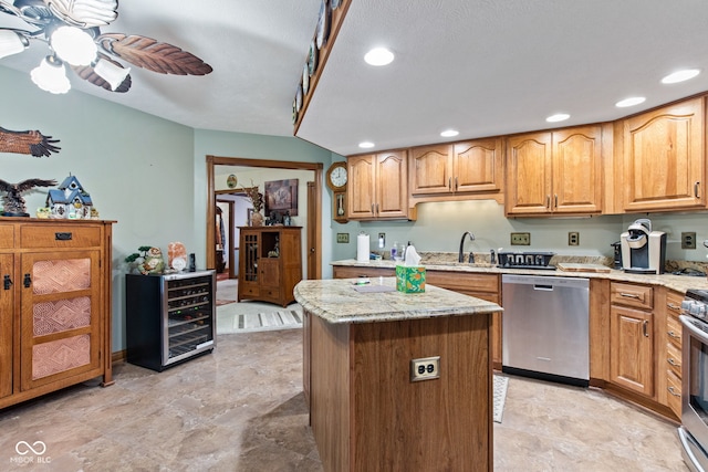 6980 White Oak Dr, Avon, IN 46123 - kitchen with stainless steel dishwasher, wine cooler, recessed lighting, a center island, and light stone counters