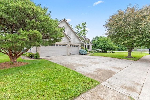 6980 White Oak Dr, Avon, IN 46123 - view of front of property featuring driveway, a front yard, brick siding, and an attached garage