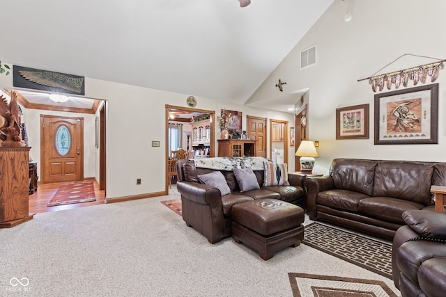 6980 White Oak Dr, Avon, IN 46123 - carpeted living room with lofted ceiling and baseboards