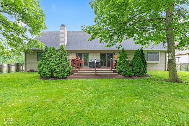 6980 White Oak Dr, Avon, IN 46123 - rear view of property featuring brick siding, a chimney, a wooden deck, and a shingled roof