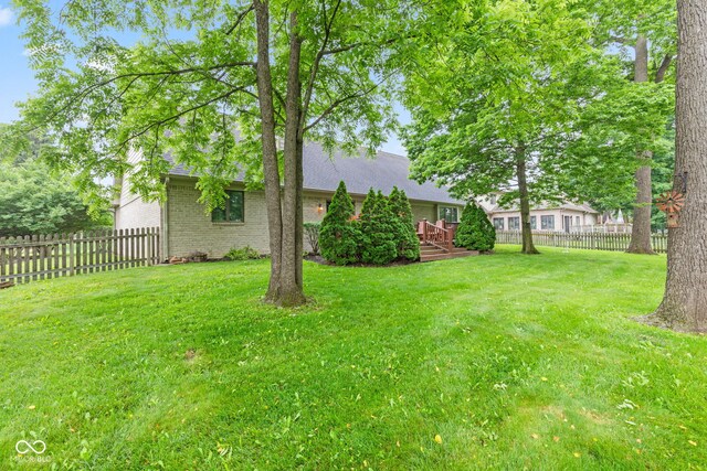 6980 White Oak Dr, Avon, IN 46123 - fenced backyard with a deck and a garage