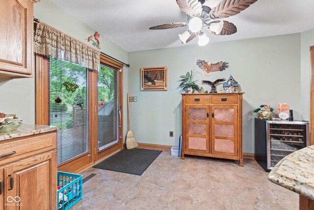 6980 White Oak Dr, Avon, IN 46123 - doorway with ceiling fan and stone finish flooring