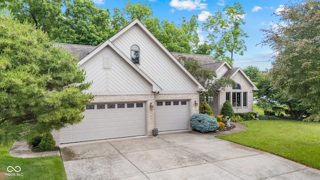 6980 White Oak Dr, Avon, IN 46123 - view of front facade featuring driveway, a front yard, brick siding, a shingled roof, and an attached garage
