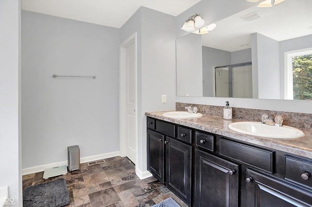 773 Bracknell Dr, Avon, IN 46123 - full bathroom featuring double vanity, stone finish flooring, and a stall shower