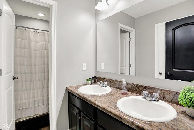 773 Bracknell Dr, Avon, IN 46123 - bathroom featuring double vanity and a shower with shower curtain