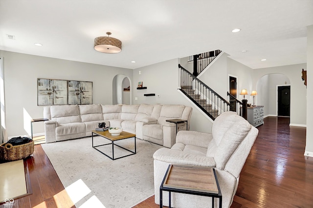 773 Bracknell Dr, Avon, IN 46123 - living room featuring arched walkways, stairs, wood finished floors, and recessed lighting