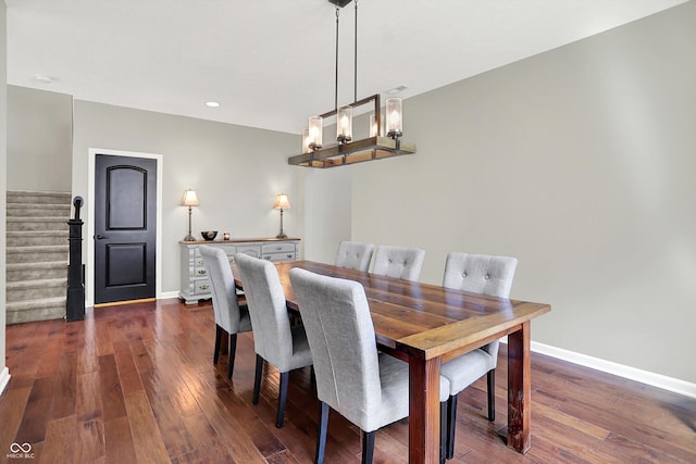 773 Bracknell Dr, Avon, IN 46123 - dining room with stairs, dark wood-type flooring, recessed lighting, and a chandelier