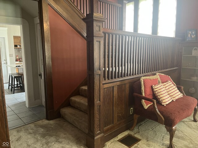 1131 N Main St, Rushville, IN 46173 - stairs with carpet flooring and tile patterned flooring