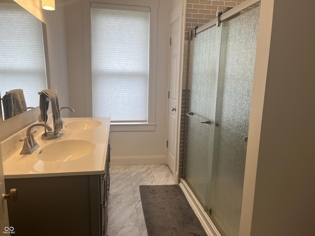 1131 N Main St, Rushville, IN 46173 - bathroom with double vanity, a shower stall, and marble look tile flooring