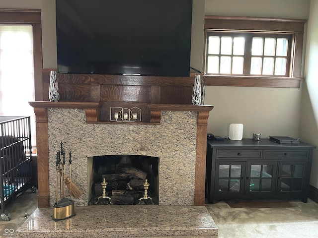 1131 N Main St, Rushville, IN 46173 - carpeted living room featuring a high end fireplace