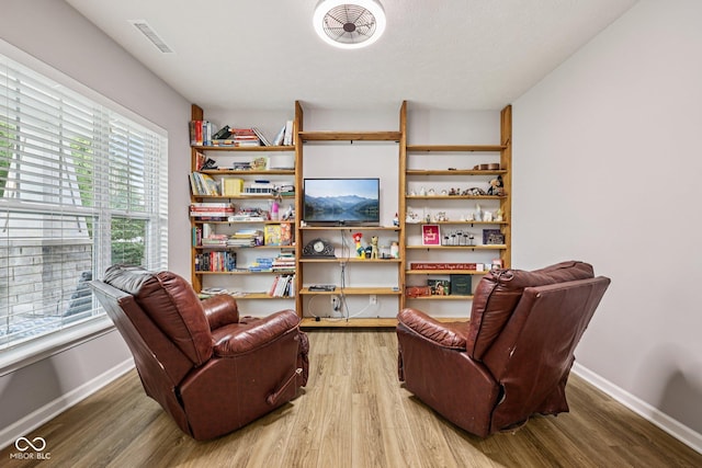 8126 Kilborn Way, Avon, IN 46123 - living area with light wood-type flooring and baseboards