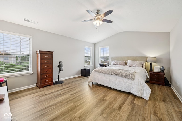 8126 Kilborn Way, Avon, IN 46123 - bedroom with vaulted ceiling, light wood-type flooring, and ceiling fan