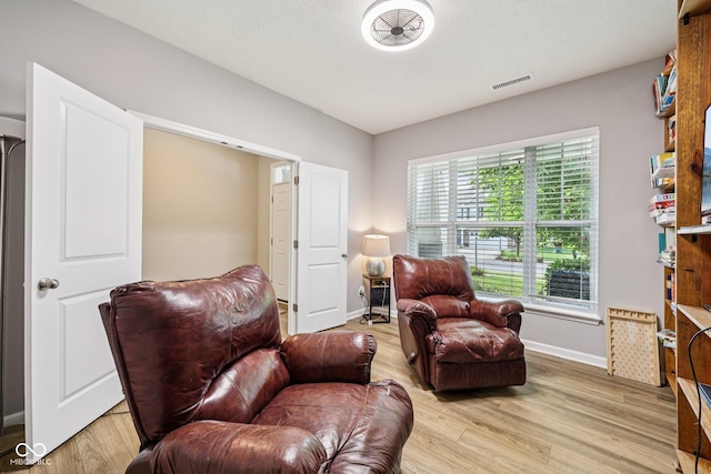 8126 Kilborn Way, Avon, IN 46123 - living area with light wood-type flooring and baseboards