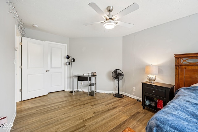 8126 Kilborn Way, Avon, IN 46123 - bedroom with wood finished floors and ceiling fan