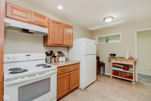 4218 E 18th St, Indianapolis, IN 46218 - kitchen with white appliances, under cabinet range hood, light countertops, and light carpet