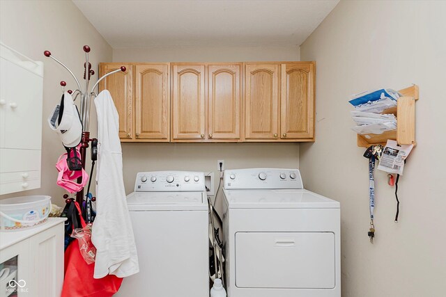 4218 E 18th St, Indianapolis, IN 46218 - laundry area with washer and dryer and cabinet space