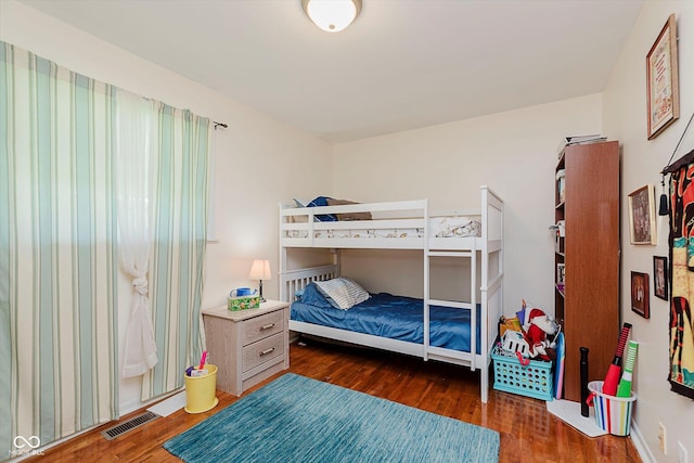 4218 E 18th St, Indianapolis, IN 46218 - bedroom with wood finished floors
