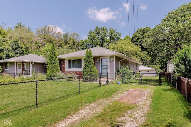 4218 E 18th St, Indianapolis, IN 46218 - view of front of property featuring a fenced backyard and brick siding