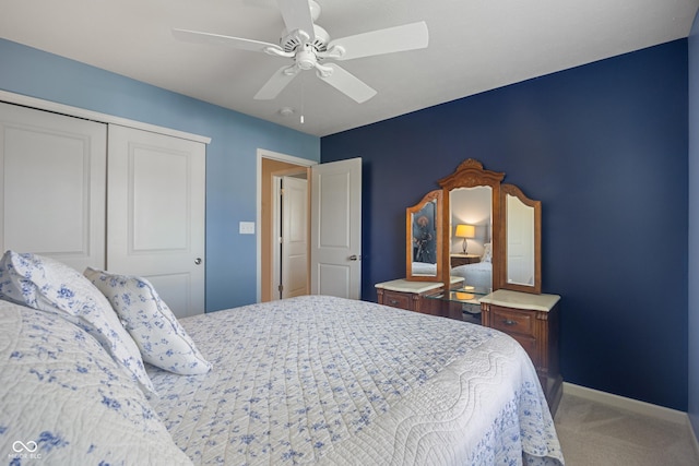 13992 Wynngate Ln, Fishers, IN 46038 - bedroom with light colored carpet, a closet, and a ceiling fan