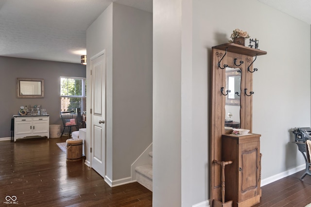 13992 Wynngate Ln, Fishers, IN 46038 - hallway featuring dark wood-style floors and stairway