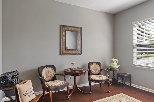 13992 Wynngate Ln, Fishers, IN 46038 - sitting room featuring plenty of natural light and wood finished floors