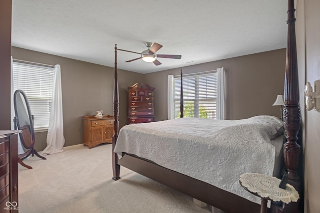 13992 Wynngate Ln, Fishers, IN 46038 - bedroom with light carpet and a ceiling fan