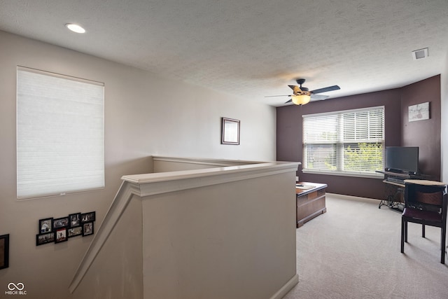 13992 Wynngate Ln, Fishers, IN 46038 - carpeted living area with ceiling fan, a textured ceiling, and recessed lighting