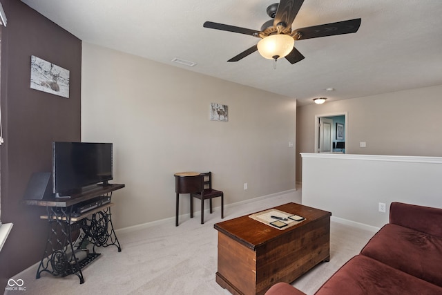13992 Wynngate Ln, Fishers, IN 46038 - living room with a ceiling fan and light carpet